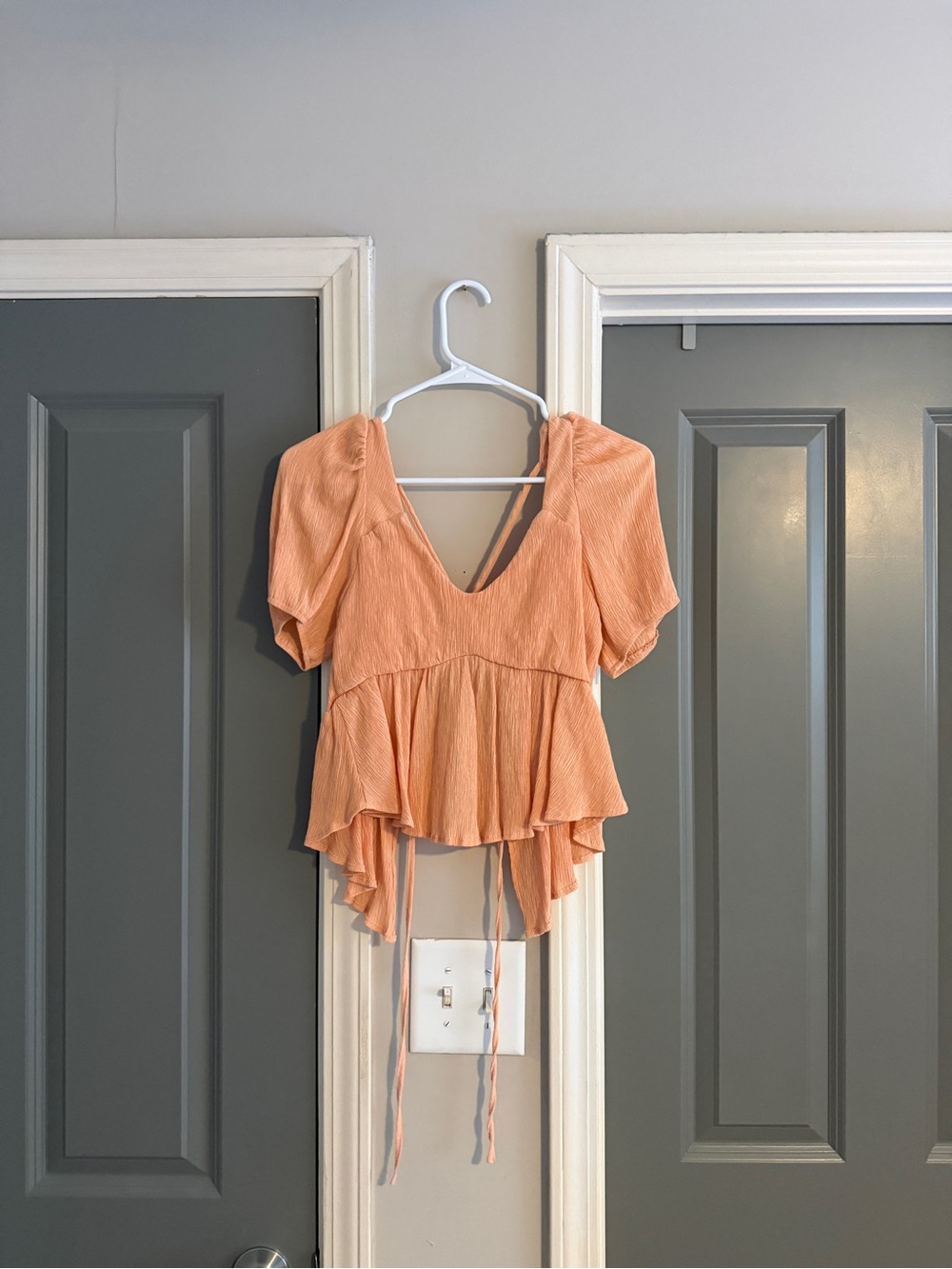 vestique Peach Peplum Tie-Back Blouse